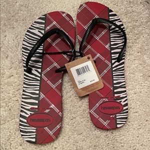 Size 7/8 Havaianas red/black flip flops